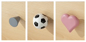 Picture of 'his and hers handles' (football and pink heart) for chests of drawers from Asda.